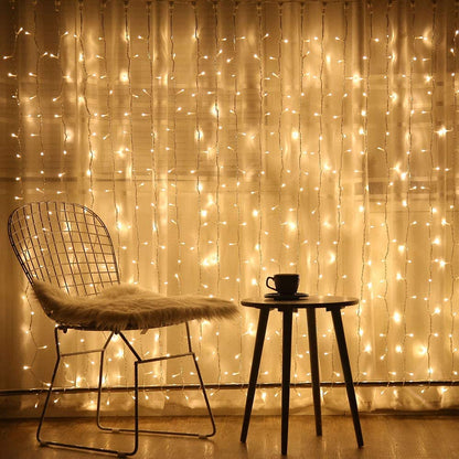 9.8 Ft Hanging Window Curtain Lights with 300 LEDs create a magical ambiance with dimmable brightness and easy control via remote. Perfect for decorating windows, adding a festive touch to any room or holiday event.