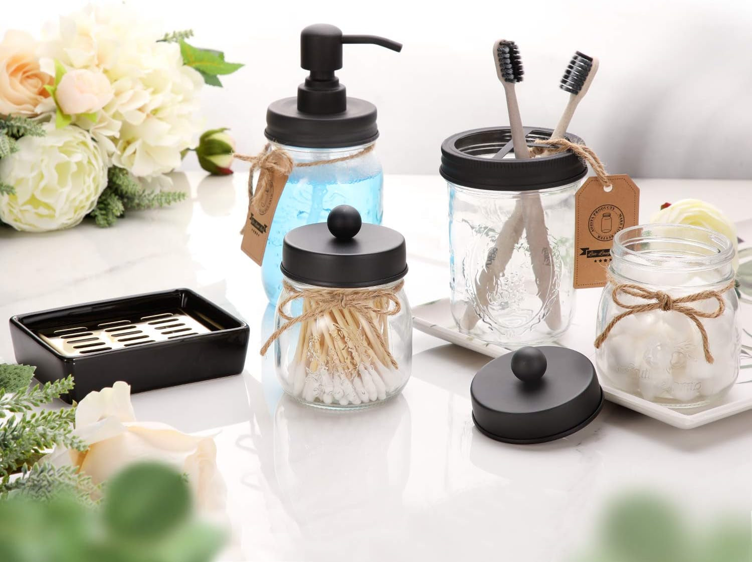 Mason Apothecary Jar Bathroom Accessories Set is a stylish and functional collection, perfect for organizing toiletries and adding vintage charm to your bathroom. Available at a great price, this clearance set includes jars for cotton balls, swabs, and more.