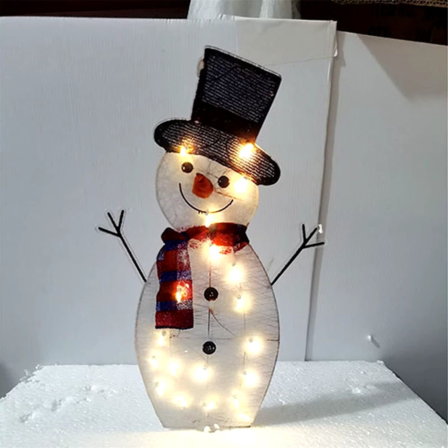 Snowman Christmas Inflatable with LED Lights brings festive cheer to your outdoor décor with bright, colorful lights. This inflatable snowman adds a playful touch to your yard, perfect for holiday celebrations and creating a welcoming atmosphere.